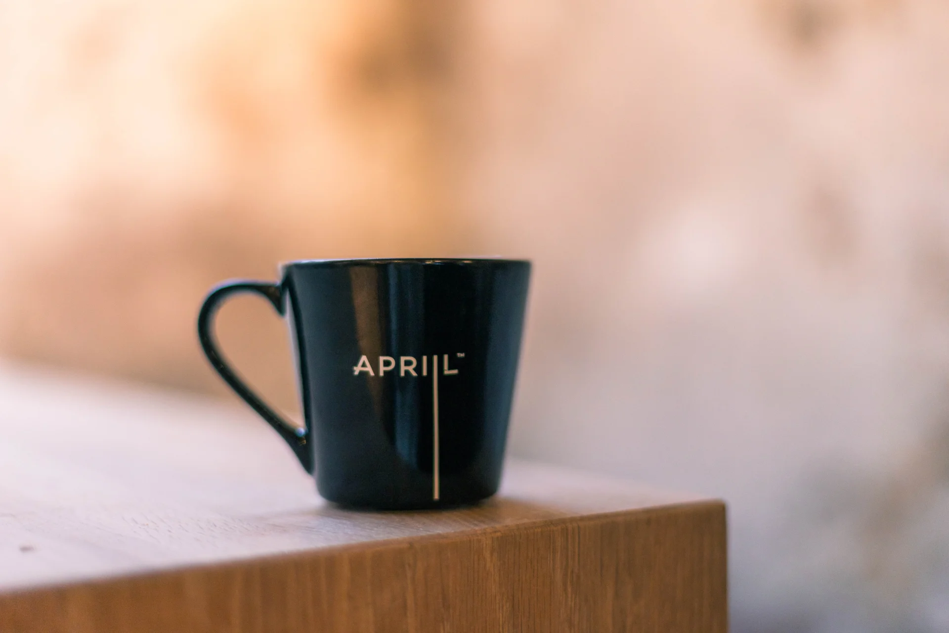Kaffekopp med Apriil-logo